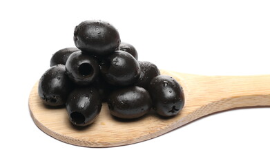 Black olives with wooden spoon isolated on white background