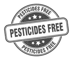 Obraz premium pesticides free stamp. pesticides free label. round grunge sign