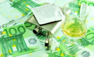 Drinking alcohol, spending a lot of money for it.