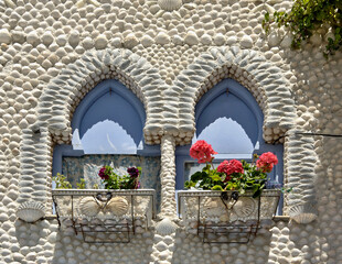 Shell decorated house facade in Peniscola, Castellon - Spain