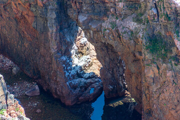 Picturesque landscape overlooking the rocks and the sea on a sunny summer day on the Shkota island in Vladivostok.