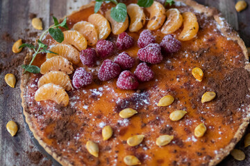 
Homemade pumpkin pie on different backgrounds.