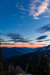 amazing view of the sunset over the snow-capped peaks of the italian alps