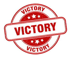 victory stamp. victory label. round grunge sign