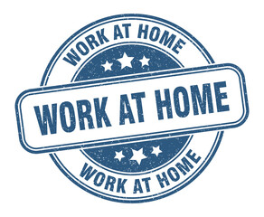 Fototapeta premium work at home stamp. work at home label. round grunge sign