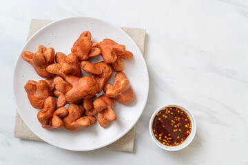 fried sausage with dipping sauce