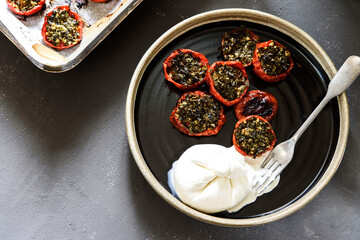 Provencal Tomatoes. Baked Tomatoes with parsley, garlic and olive oil served with burrata cheese