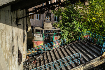 Old abandoned cable car station in Yerevan, dilapidated vagon