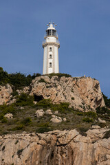 Fototapeta na wymiar lighthouse on the coast of the island