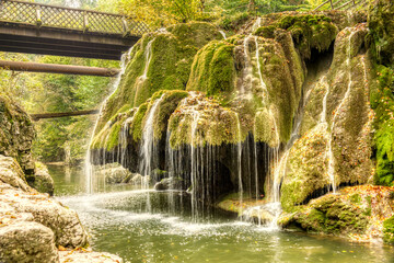 The unique Bigar waterfall full of green moss, Romania