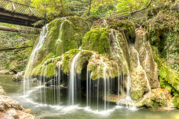 The unique Bigar waterfall full of green moss, Romania