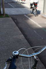 Fototapeta na wymiar Biking in the city in a summer day