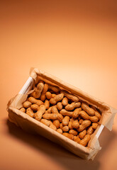 Peanuts in a wooden container