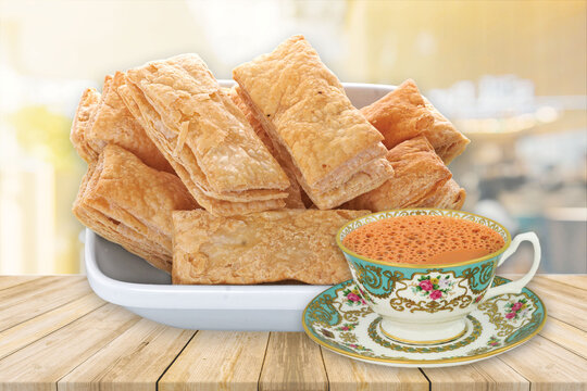 indian khari or kharee or salty Puff Pastry Snacks, with tea, Khari bread Rusk, Puff Pastry Snacks, fresh square shaped puff pastry biscuit snacks with puffed crispy golden brown crust layers khari