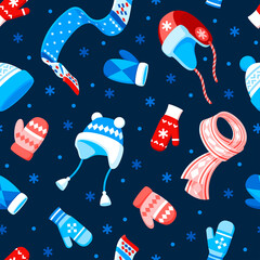 Seamless vector pattern of winter hats, mittens, scarves and snowflakes on a dark blue background.