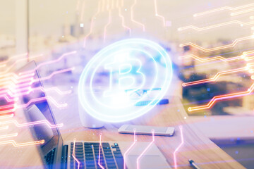 Fototapeta premium Double exposure of blockchain theme hologram and table with computer background. Concept of bitcoin crypto currency.