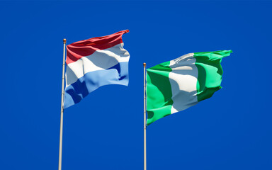 Beautiful national state flags of Netherlands and Nigeria.