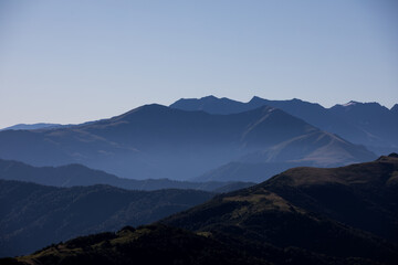 View of endless mountain ranges in the haze of the day