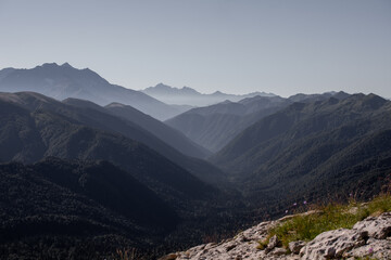 Fototapeta premium View of endless mountain ranges in the haze of the day