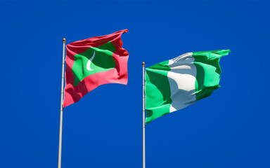 Beautiful national state flags of Maldives and Nigeria.