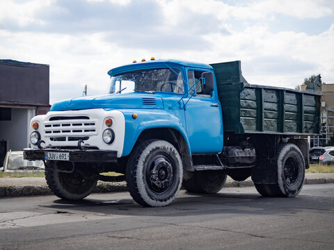 CHISINAU, MOLDOVA-SEPTEMBER 6, 2019: 1977 ZiL-130 (431410) (second series grille) dump truck at city streets. It was one of the most numerous cargo trucks in the USSR