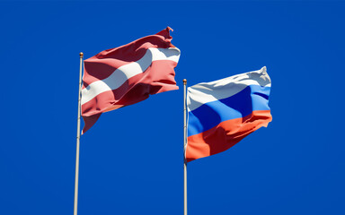 Beautiful national state flags of Latvia and Russia.