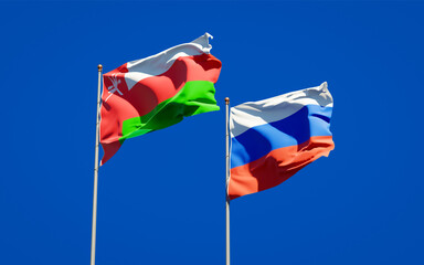 Beautiful national state flags of Oman and Russia.