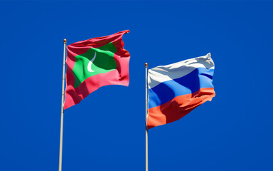Beautiful national state flags of Maldives and Russia.