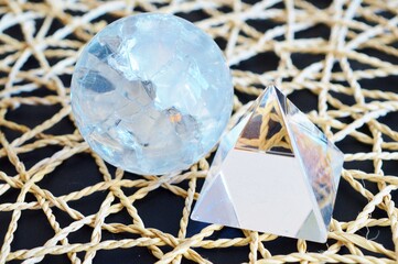crystal ball and money pyramid