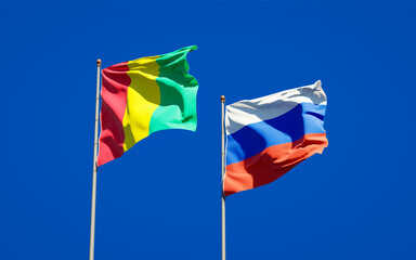 Beautiful national state flags of Guinea and Russia.
