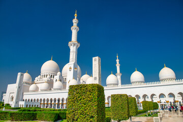 Fototapeta na wymiar ABU DHABI, UAE - DECEMBER 7, 2016: Exterior view of the Sheikh Zayed Grand Mosque