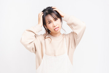 Fototapeta premium 悩み事を抱える若い女性