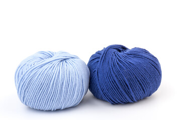 woolen merinos blue threads on white background. natural wool. knitting. background