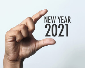 Happy new year 2021 with hand.
