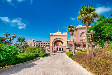 ABU DHABI, UAE - DECEMBER 8, 2016: Abu Dhabi Emirates Palace near Corniche Road on a beautiful sunny day