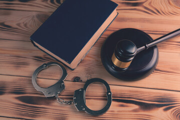 Legal law concept image - gavel and handcuffs