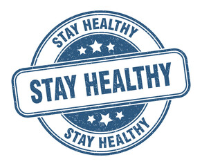 Fototapeta premium stay healthy stamp. stay healthy label. round grunge sign
