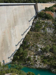Magnificent and imposing Bimont dam with its almost endless metal stairs clinging to the concrete...