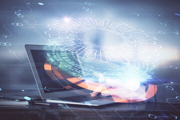A man working on Laptop with technology theme drawing. Concept of big data. Double exposure.