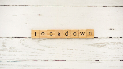 lockdown.words from wooden cubes with letters photo
