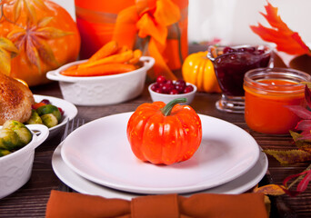 Autumn table setting. Thanksgiving dinner and autumn decoration.