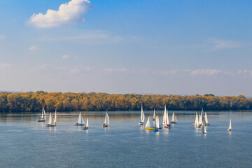 Obraz premium Yachts at sailing regatta on the Dnieper river in Kremenchug, Ukraine