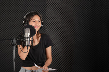 Fototapeta na wymiar teenage singer in music studio