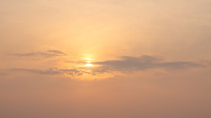 Colourful sunrise sky wispy clouds covering the sun. landscape background.