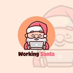 CUTE SANTA SMILING WHILE WORKING ON HIS LAPTOP