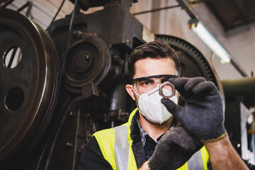 The quality checks of the manufactured metal part.