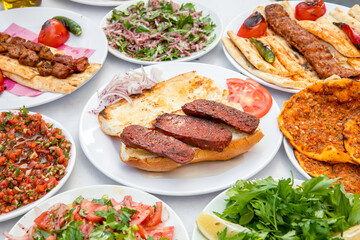 Turkish sausage also known as Sucuk. Grilled or barbecued Turkish sausage on the table in the Turkish restaurant.