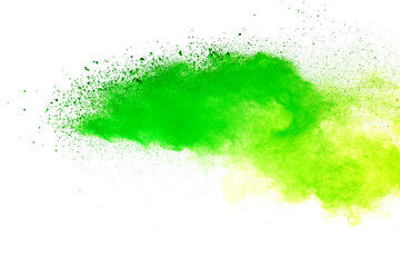 Freeze motion of green color powder exploding on white background.