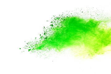 Freeze motion of green color powder exploding on white background.