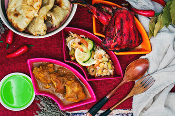 Traditional Indian food chicken tandoori and Tikka with garlic naan